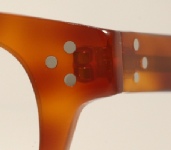 PLASTIC VINTAGE EYEGLASSES DETAIL photo, under 350 kb